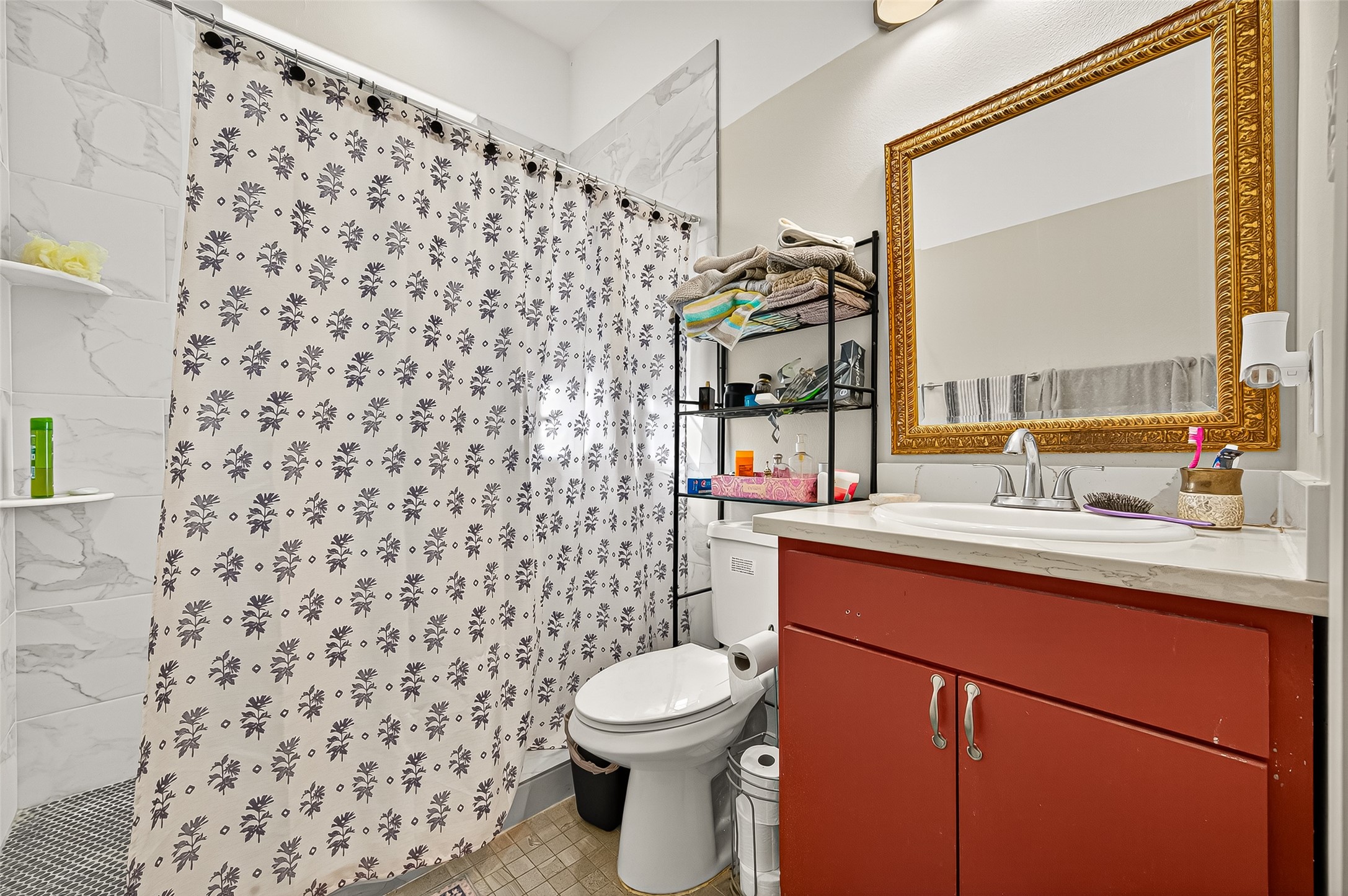 7915 Kirk Road Rosenberg, TX 77471 - Photo 41 of 46 a bathroom with a sink toilet and shower