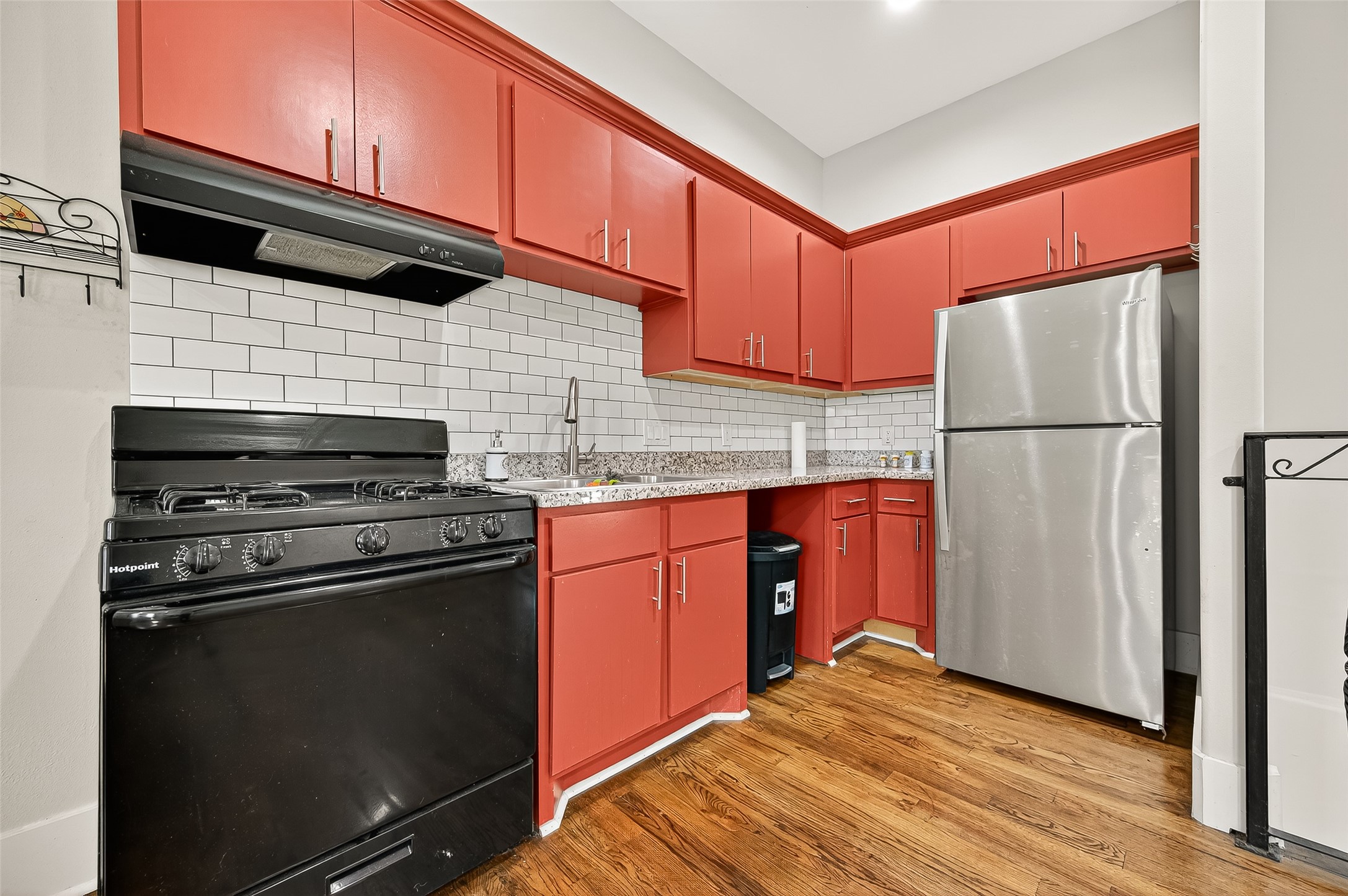 7915 Kirk Road Rosenberg, TX 77471 - Photo 42 of 46 a kitchen with a refrigerator stove and cabinets