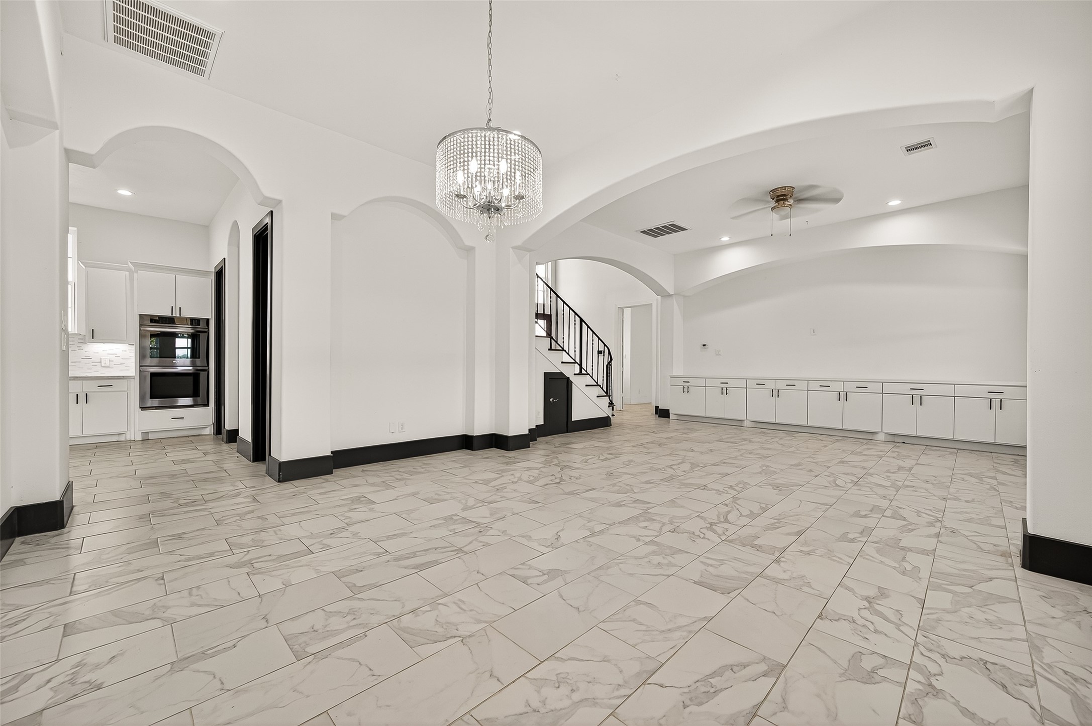 7915 Kirk Road Rosenberg, TX 77471 - Photo 7 of 46 a view of a livingroom with a chandelier