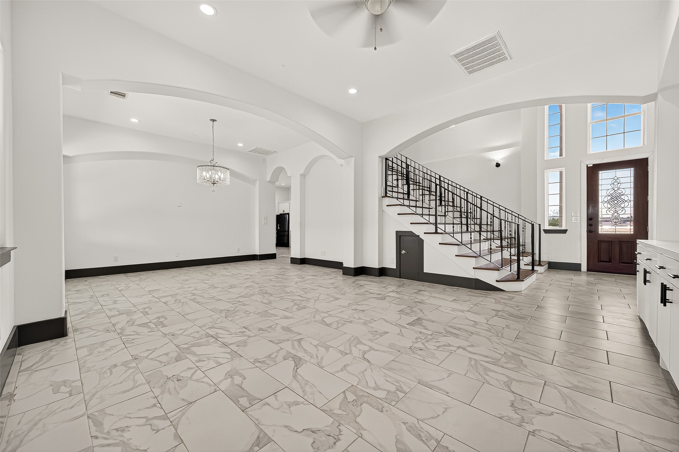 7915 Kirk Road Rosenberg, TX 77471 - Photo 9 of 46 a view of a livingroom with furniture and staircase