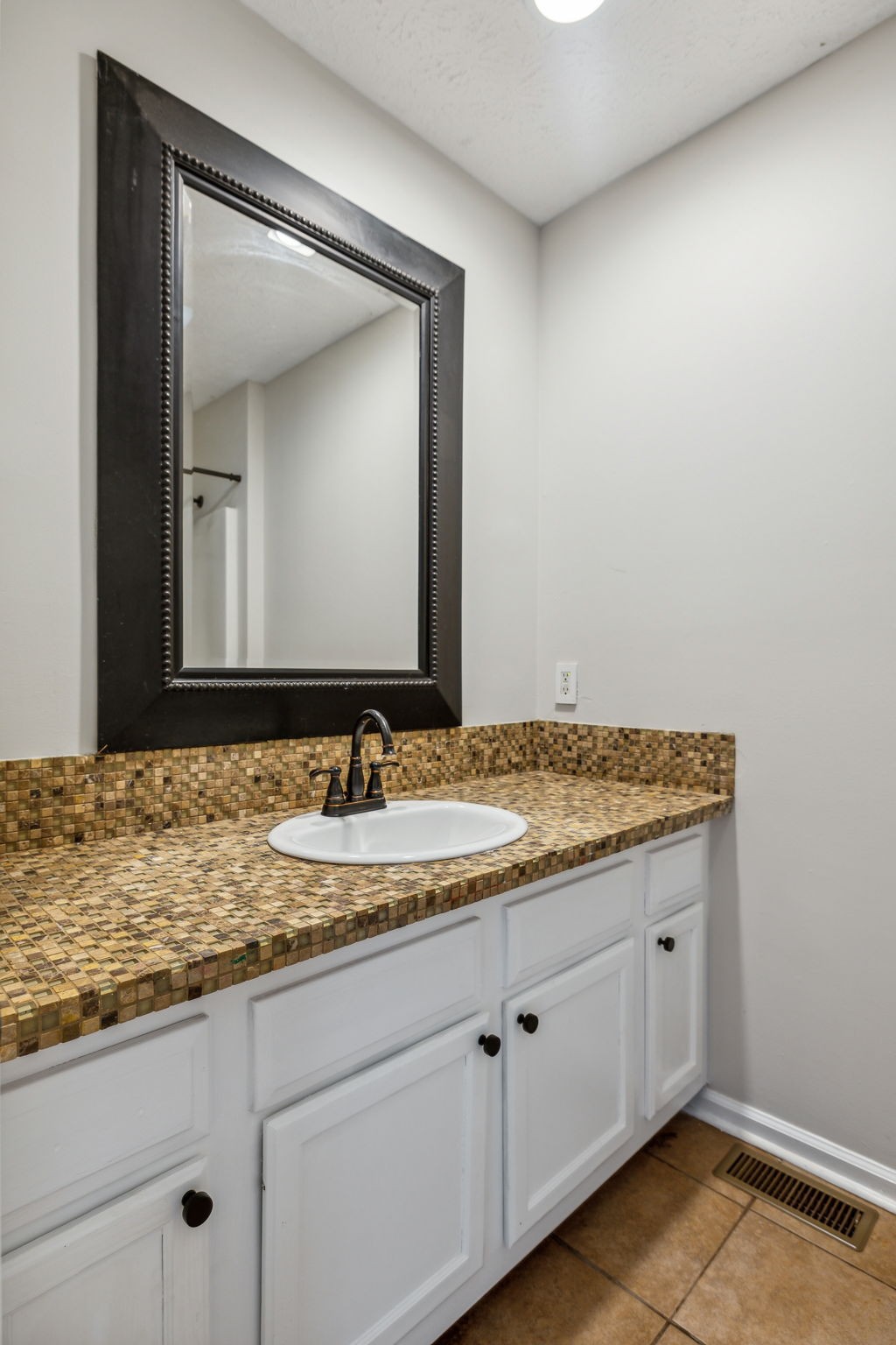 633 Audrey Road Mount Juliet, TN 37122 - Photo 17 of 30 a bathroom with a granite countertop sink and a mirror