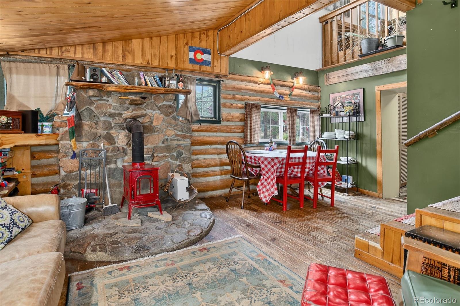 27403 Schuyler Gulch Road Pine, CO 80470 - Photo 2 of 40 a view of a room with racks