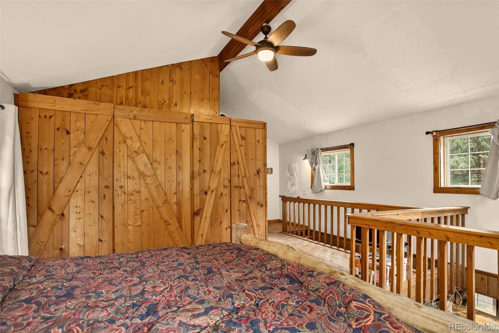 27403 Schuyler Gulch Road Pine, CO 80470 - Photo 29 of 40 a view of a hardwood & an entryway