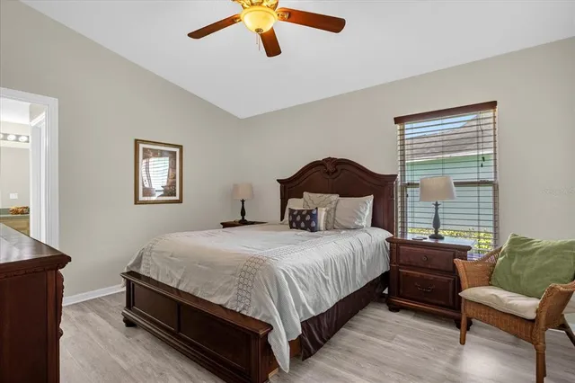 a bedroom with bed and a window