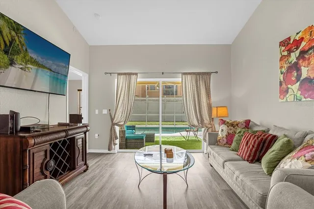 a view of a chairs in backyard of the house