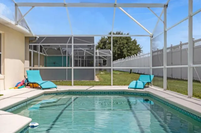 a view of a house with a swimming pool