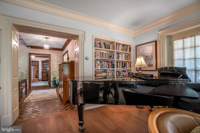 a kitchen with a sink appliances and cabinets