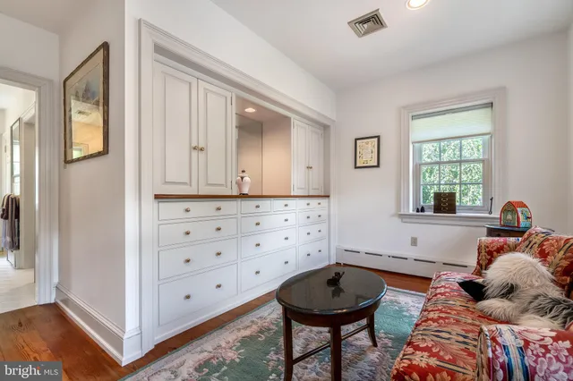 a bed room with a bed and a window