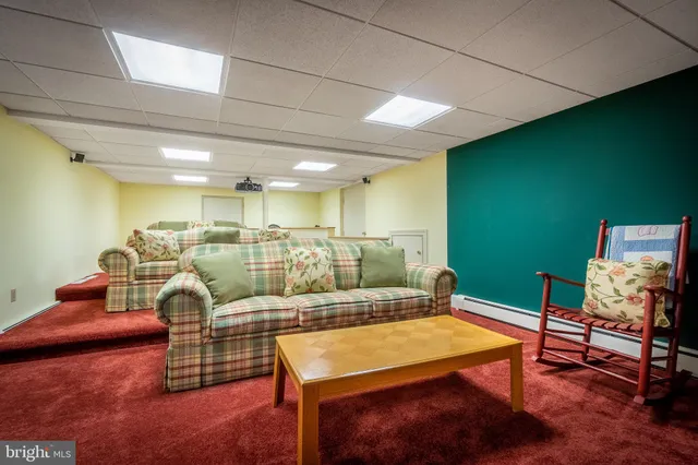 a view of kitchen with sink microwave and stove