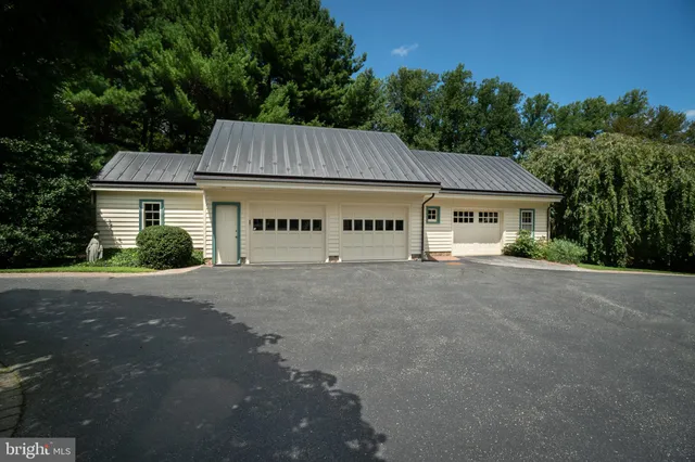 a house with trees in the background