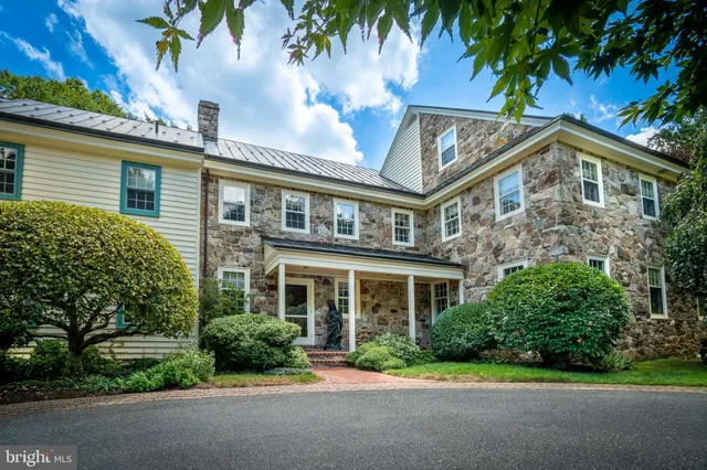 front view of a house with a garden