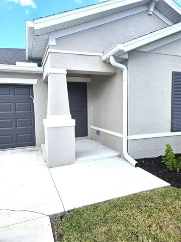 a view of a house with a garage
