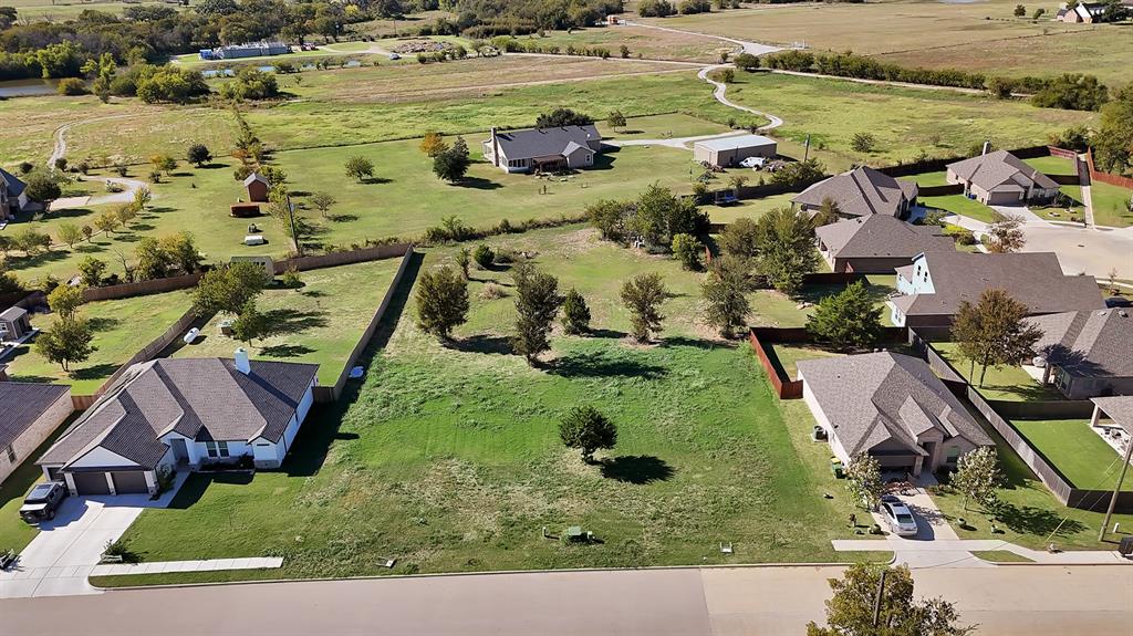 424 South 2nd Street Krum, TX 76249 - Photo 1 of 1 an aerial view of residential houses with outdoor space