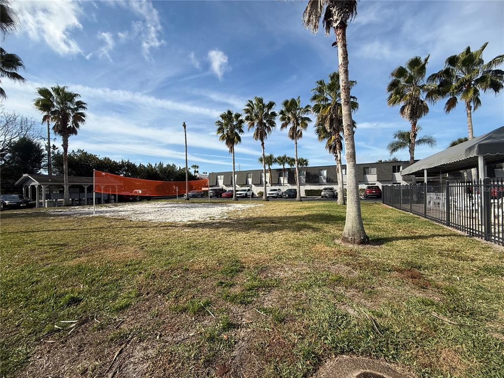 1944 South Conway Road, Unit 3 Orlando, FL 32812 - Photo 20 of 20 a view of a swimming pool with an outdoor seating