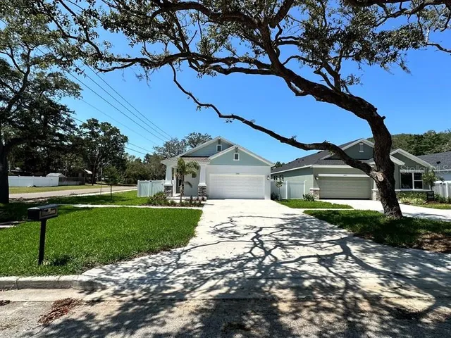 a house view with a garden space