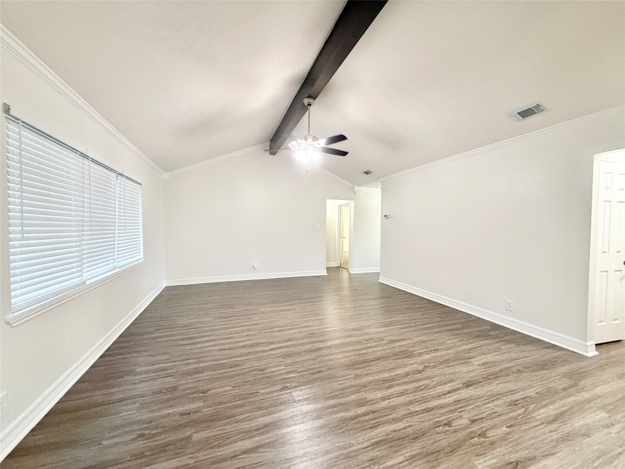 477 Oyster Creek Court Richwood, TX 77531 - Photo 5 of 33 wooden floor in an empty room with a window