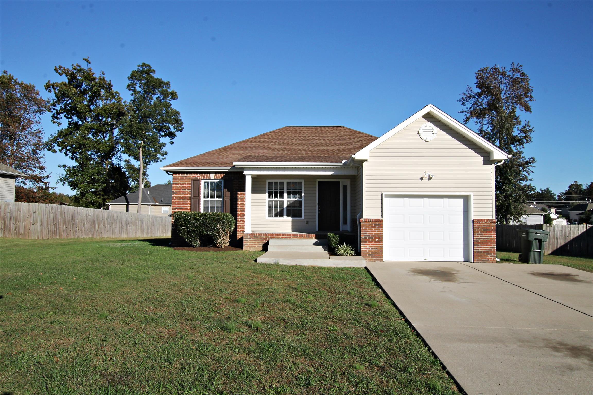 135 Filly Lane Springfield, TN 37172 - Photo 1 of 15 a front view of a house with a yard and trees