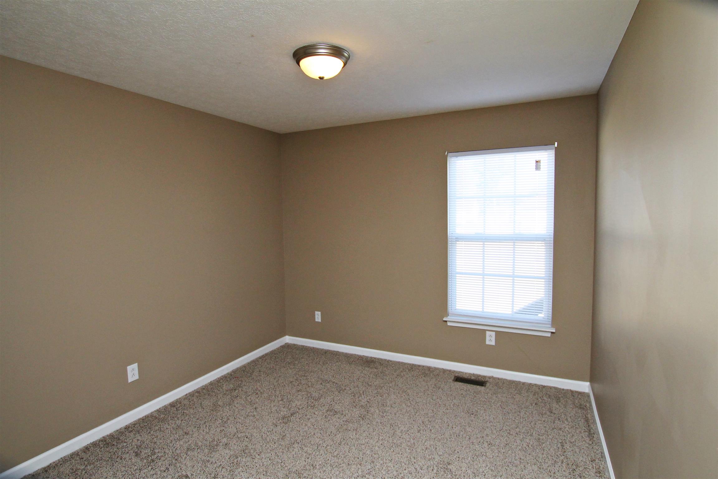 135 Filly Lane Springfield, TN 37172 - Photo 11 of 15 an empty room with a window