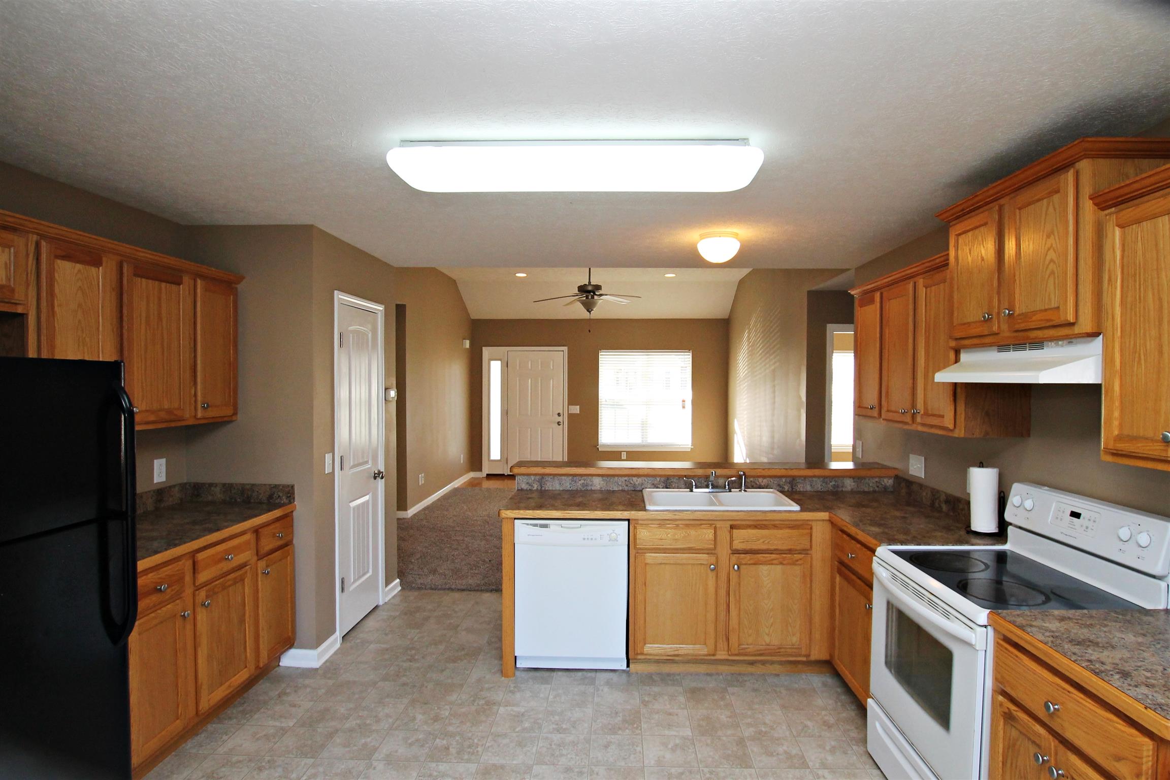 135 Filly Lane Springfield, TN 37172 - Photo 6 of 15 a kitchen with a stove a sink and a refrigerator