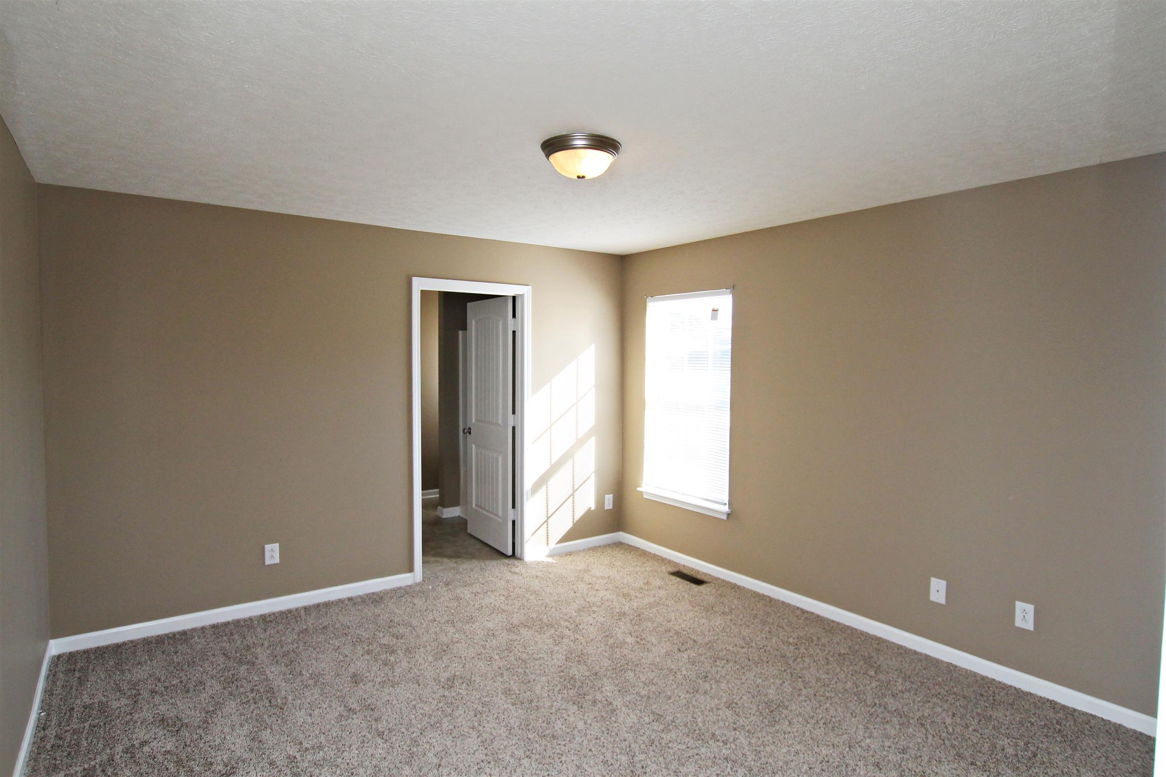 135 Filly Lane Springfield, TN 37172 - Photo 9 of 15 a view of an empty room with a window