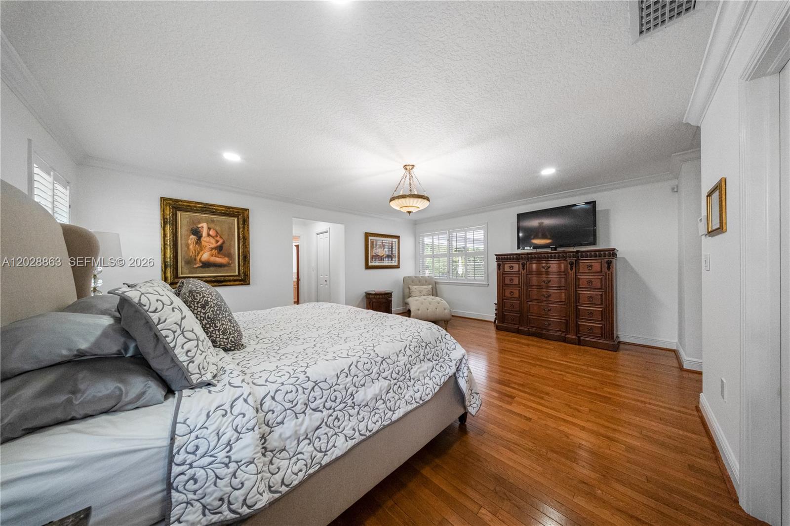 15351 Southwest 146th Street Miami, FL 33196 - Photo 37 of 86 Primary bedroom with views to the fabulous backyard.