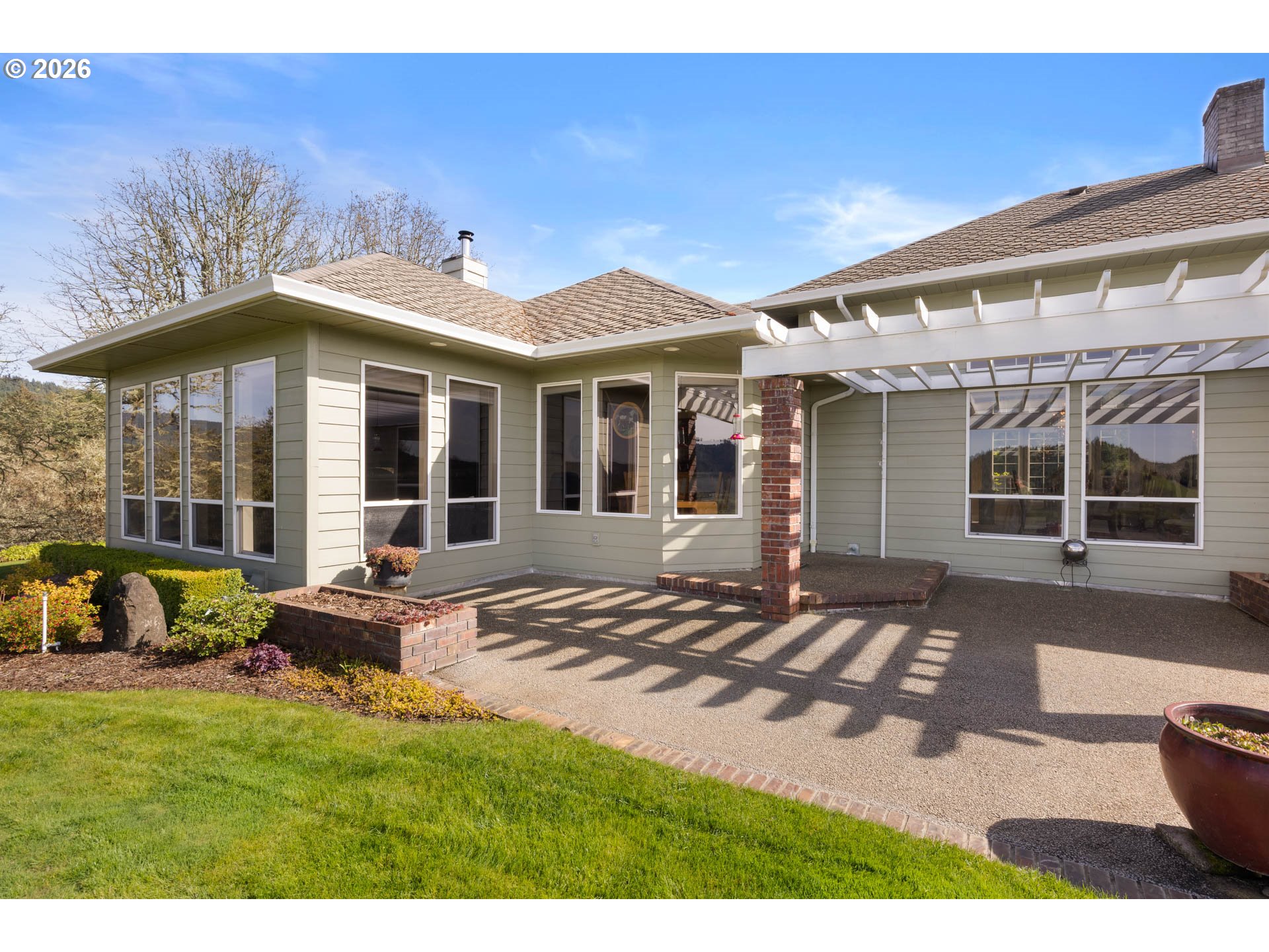 1791 Scotts Valley Road Yoncalla, OR 97499 - Photo 28 of 48 a view of a house with backyard porch and sitting area