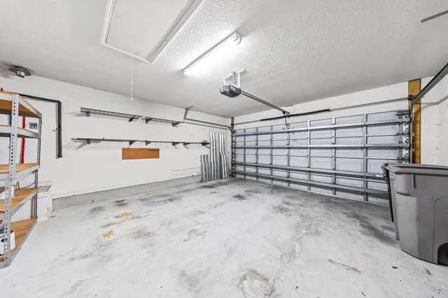 a view of a house with a yard and porch