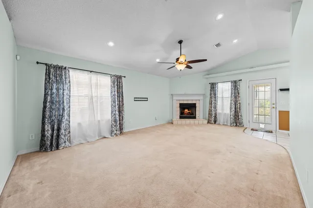a view of a livingroom with a fireplace