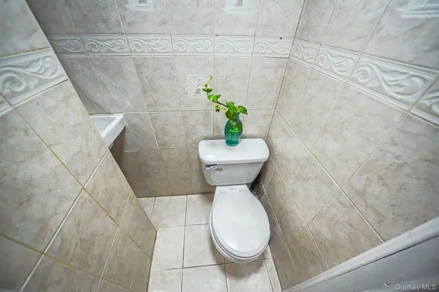a bathroom with a sink and toilet