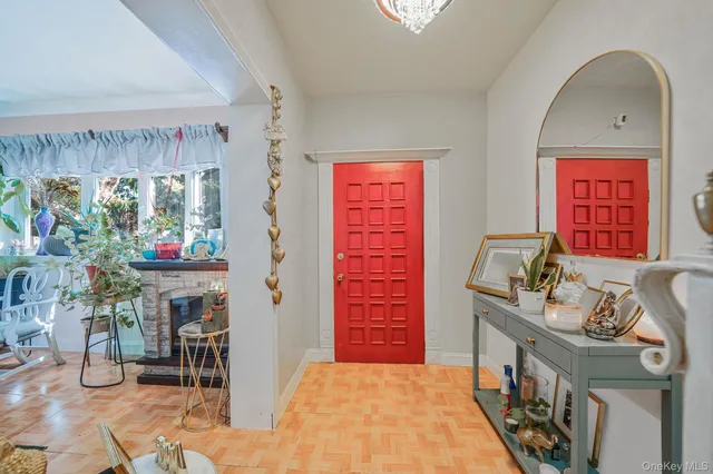 a bedroom with furniture and a flat screen tv