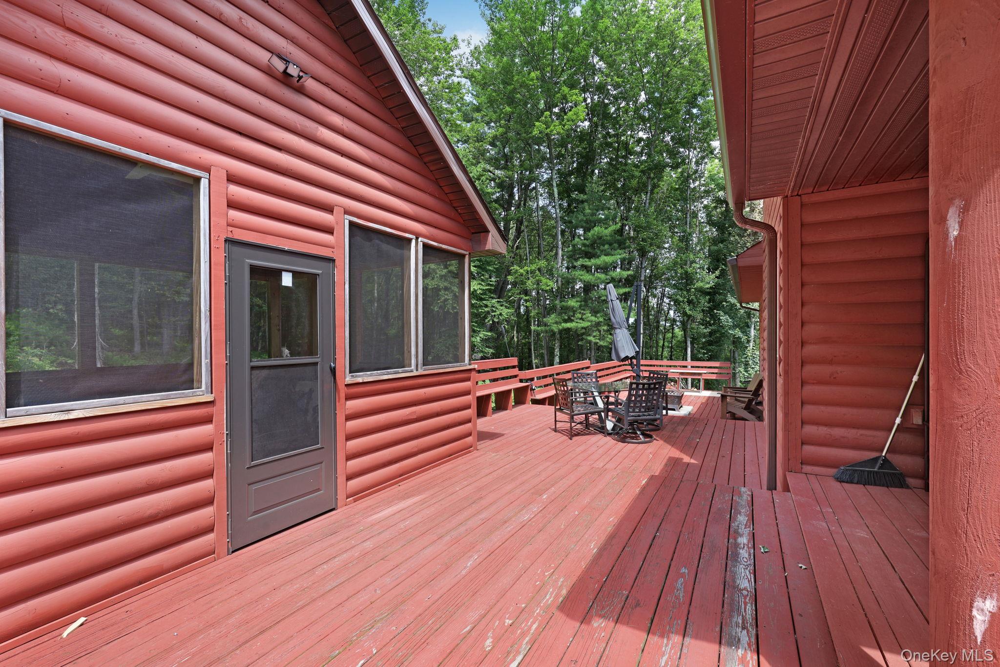 993 Hurd Road Jeffersonville, NY 12748 - Photo 6 of 49 Back deck to screen house