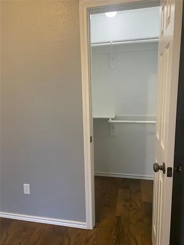 a bathroom with a granite countertop toilet sink and shower