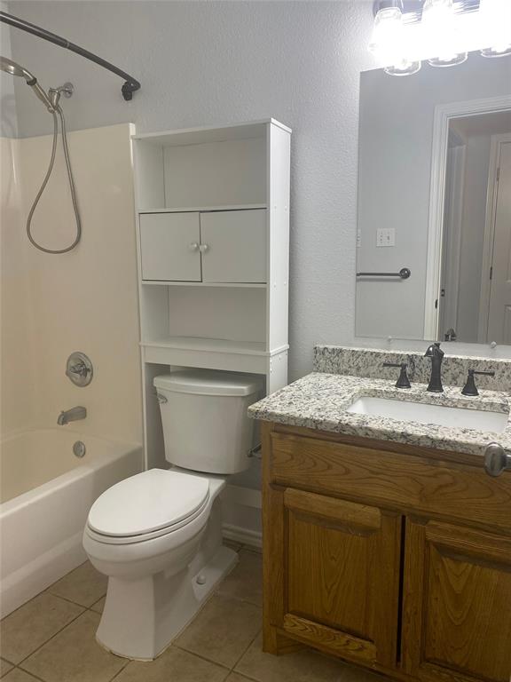 150 Hunters Circle Weatherford, TX 76088 - Photo 13 of 25 a bathroom with a granite countertop toilet sink and shower