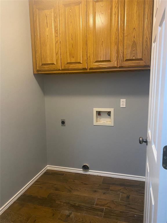 150 Hunters Circle Weatherford, TX 76088 - Photo 18 of 25 a view of an empty room with wooden floor