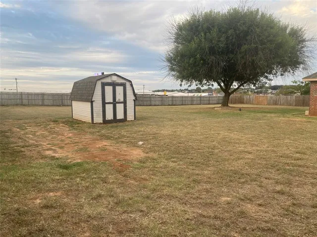 a front view of a house with yard