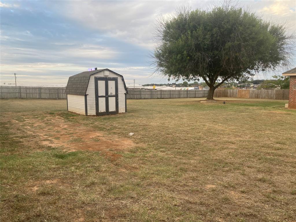 150 Hunters Circle Weatherford, TX 76088 - Photo 22 of 25 a view of a large body of water with a building in the background