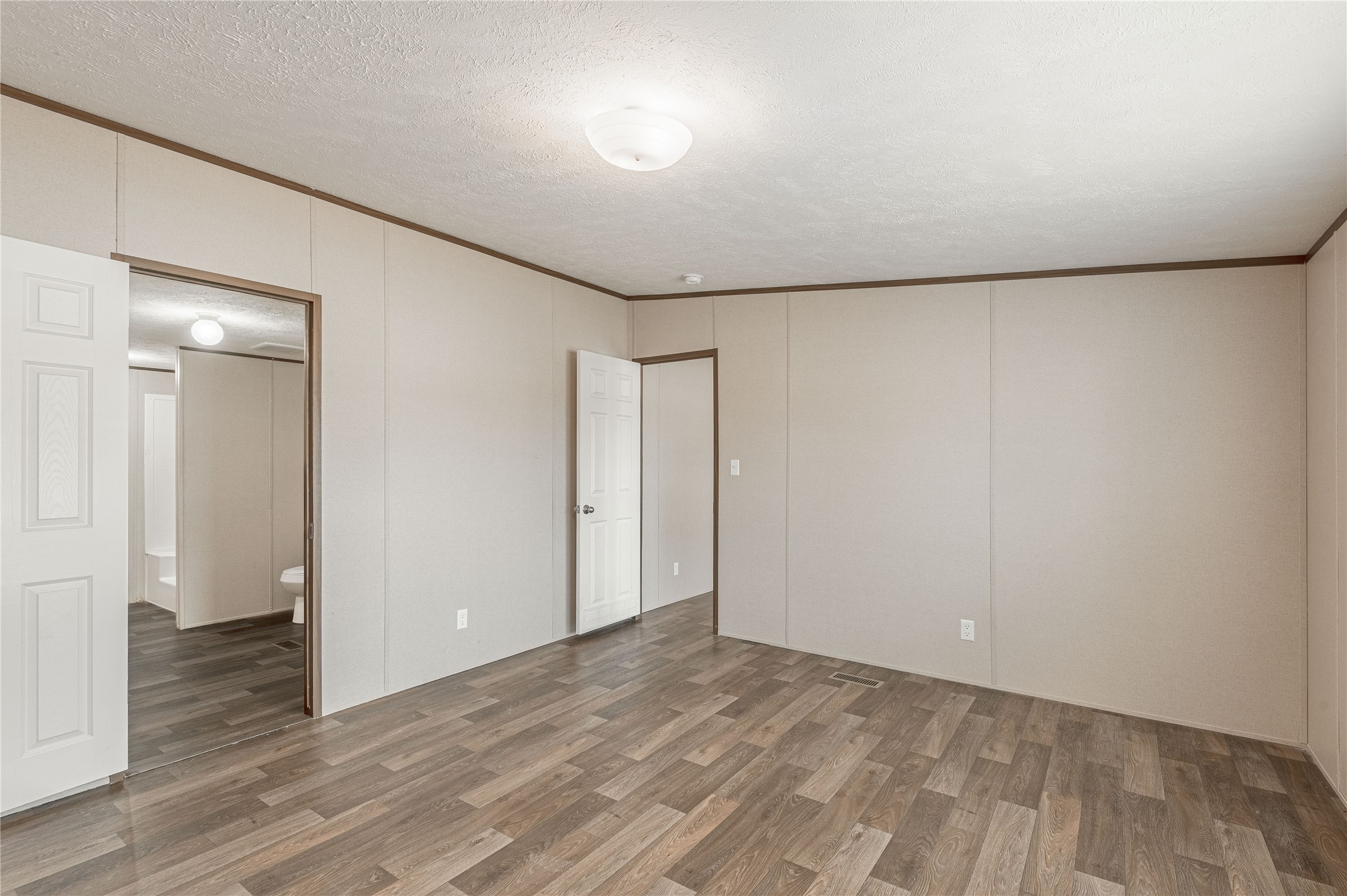 531 Canal Drive Point Blank, TX 77364 - Photo 21 of 49 Primary Bed room looking to the primary bath room.