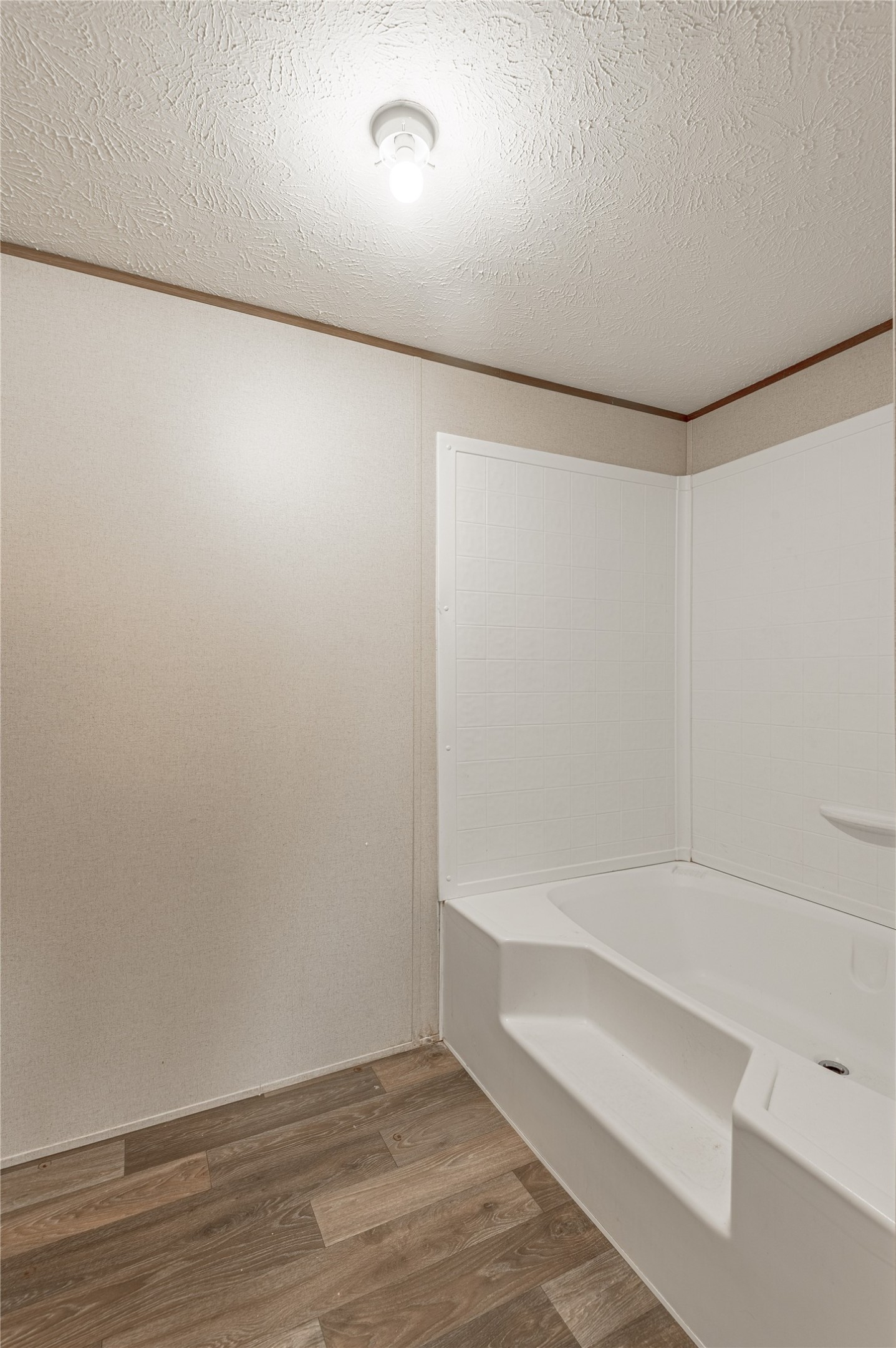 531 Canal Drive Point Blank, TX 77364 - Photo 24 of 49 Primary bath has a soaking tub/shower combo.