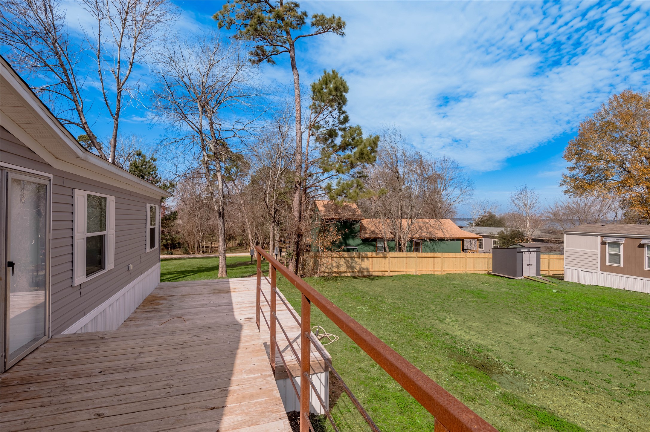531 Canal Drive Point Blank, TX 77364 - Photo 7 of 49 Lots of space on the deck for entertaining or just relaxing.
