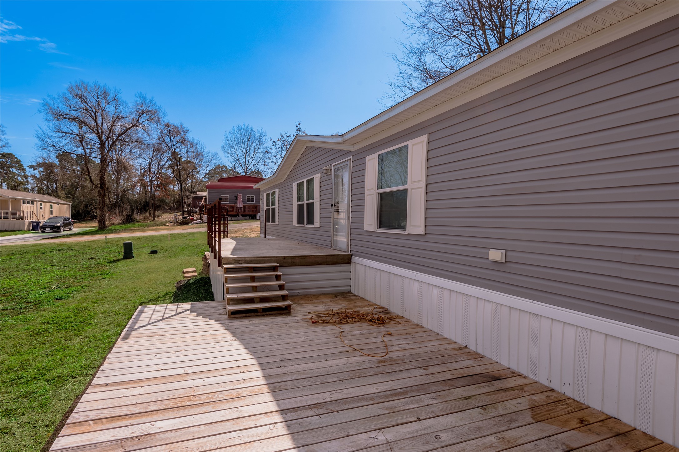 531 Canal Drive Point Blank, TX 77364 - Photo 8 of 49 Lower deck looking to the front door.