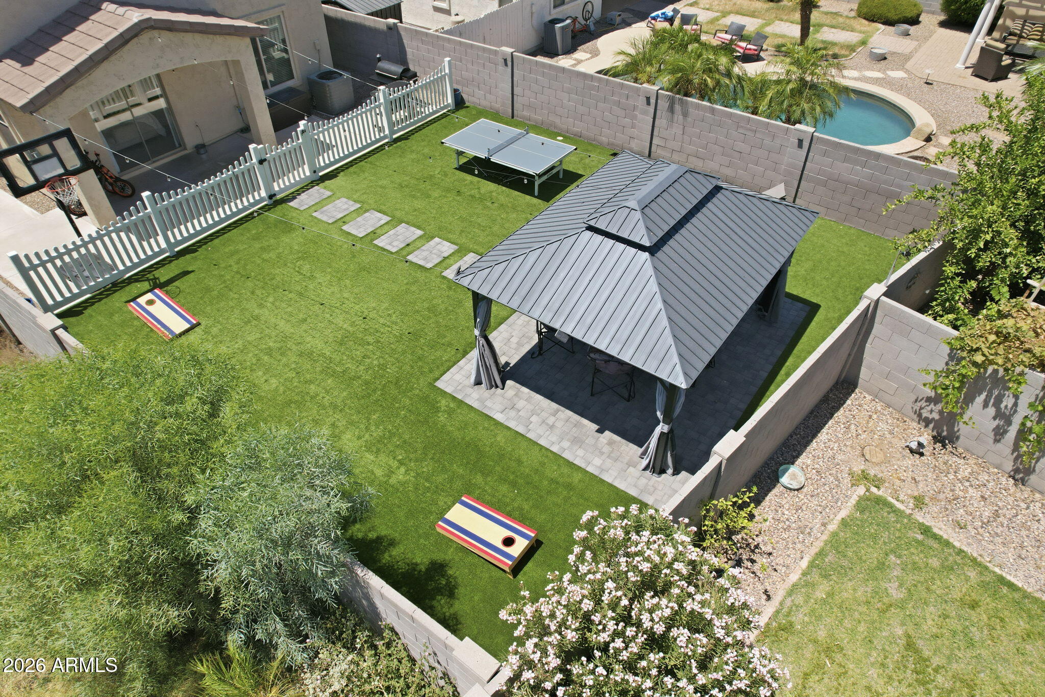 4184 East Trigger Way Gilbert, AZ 85297 - Photo 42 of 51 a view of a backyard with sitting area