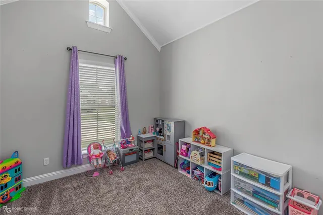 a children room with toys and a window