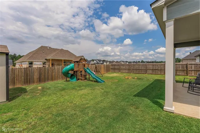 a view of a garden with a slide