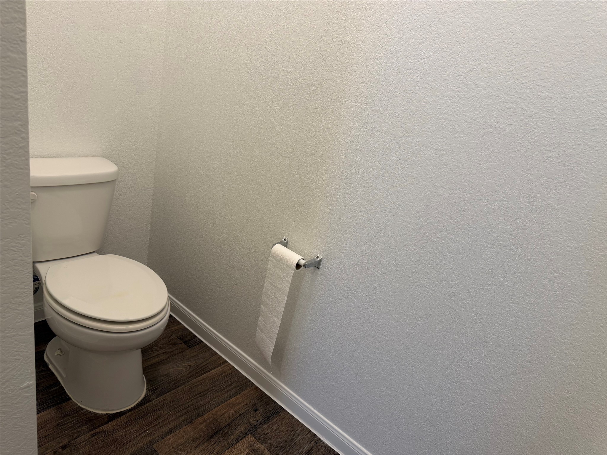 12111 Riprap Drive Manor, TX 78653 - Photo 8 of 14 a bathroom with a toilet and a sink