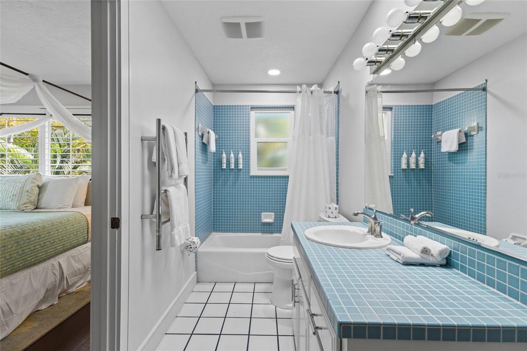 315 Spring Avenue Anna Maria, FL 34216 - Photo 34 of 63 a bathroom with a sink toilet and shower
