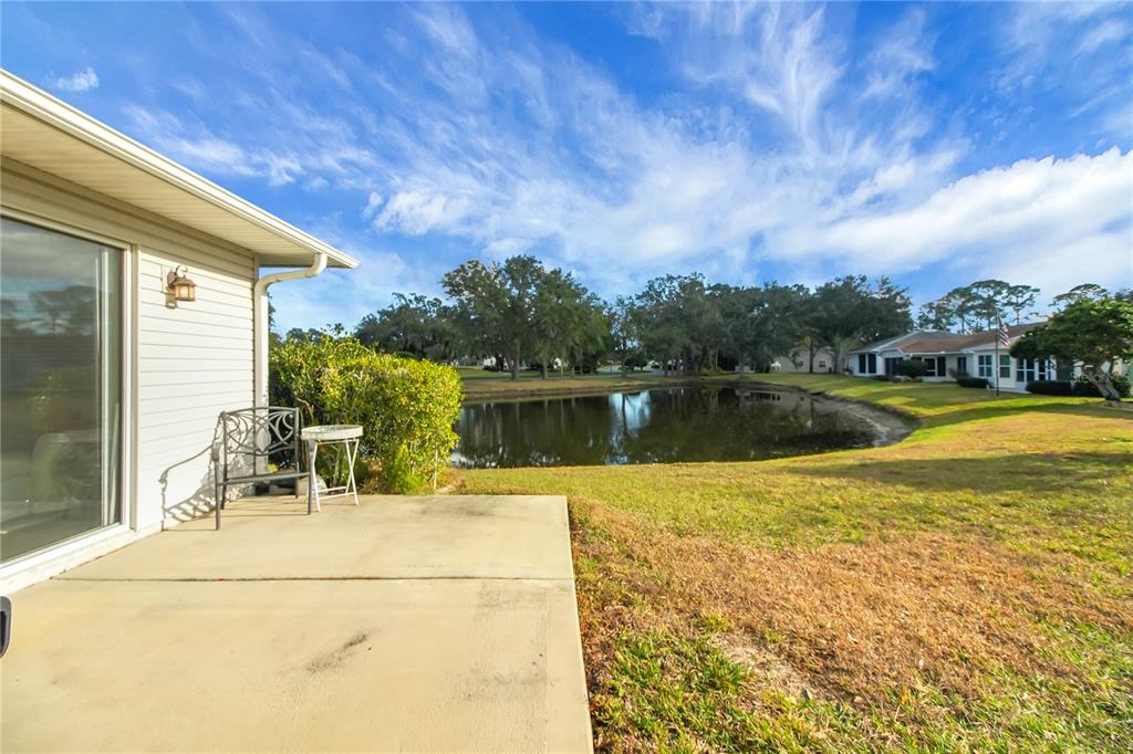 32801 Oak Park Drive Leesburg, FL 34748 - Photo 23 of 46 a view of a swimming pool with a patio