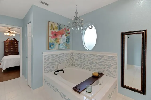 a bathroom with a sink double vanity and a mirror