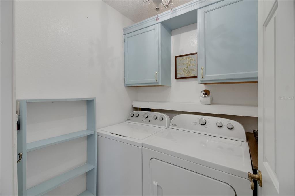 32801 Oak Park Drive Leesburg, FL 34748 - Photo 46 of 46 a utility room with dryer and washer