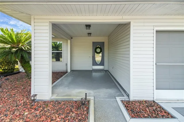 a view of entryway with wooden floor and a rug