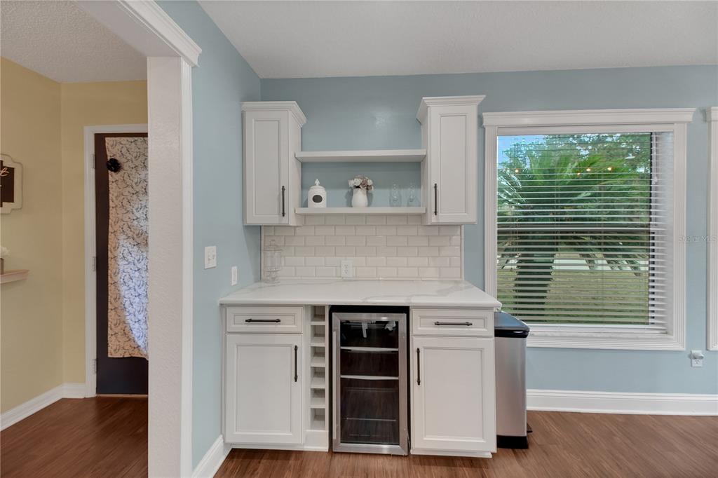 32801 Oak Park Drive Leesburg, FL 34748 - Photo 8 of 46 a kitchen with a stove and a window